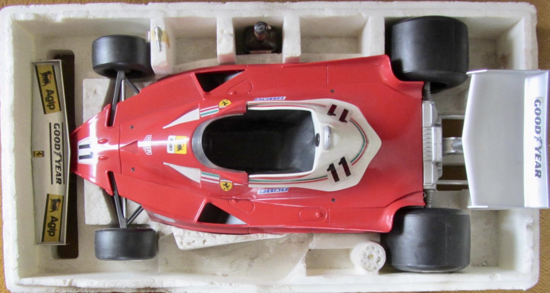 Couverture de FERRARI 312 T2 POLISTIL AVEC SA BOUTEILLE DE LIQUEUR DANS SA BOITE